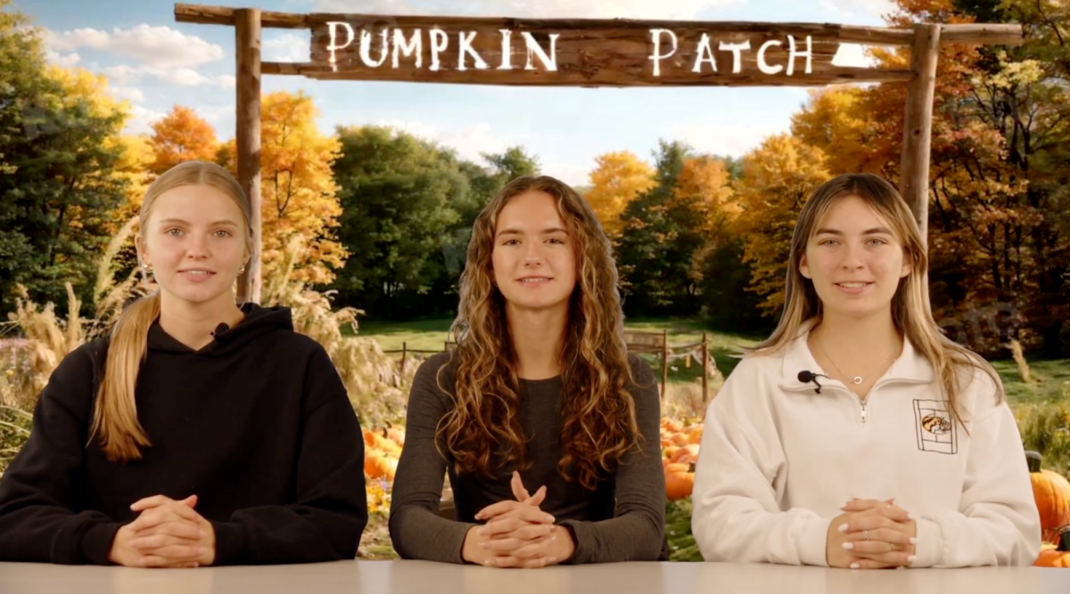 EPTV Reporters Milana Brilyak, Lauren Scheidt, and Nel Winiarczyk preparing to carve some pumpkins!